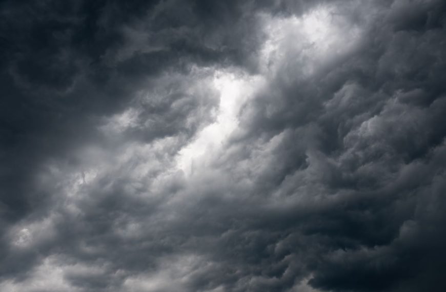 Dark storm clouds gathering over Garešnica, creating a moody and dramatic landscape scene.