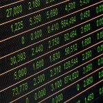 Detailed view of a stock market screen showing numbers and data, symbolizing financial trading.