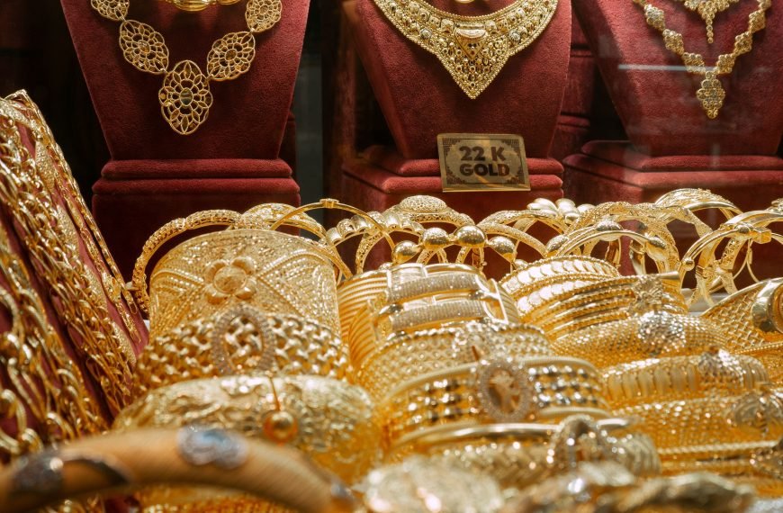 Luxurious gold jewelry display featuring necklaces and bracelets in an Istanbul store.
